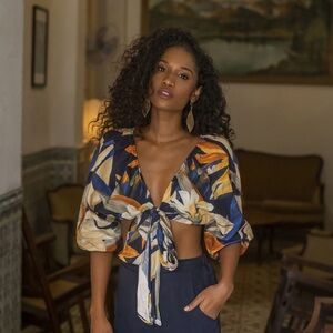 OCHIE Negril Linen Tie-Front Floral Crop Top in Navy and Orange